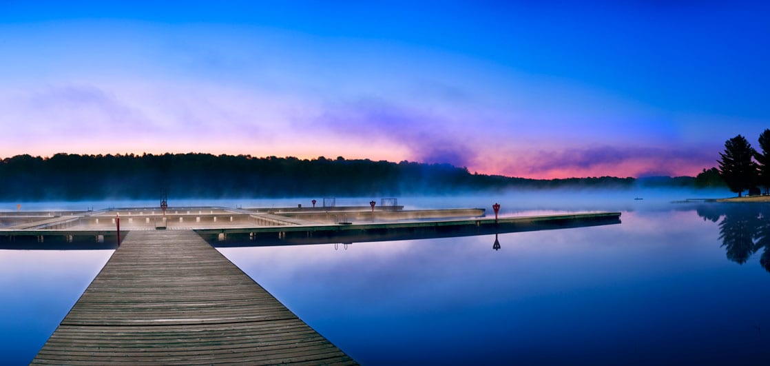 Beautiful pier shot overlooking the lake at dawn
