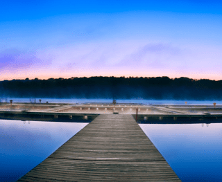 Beautiful pier shot overlooking the lake at dawn