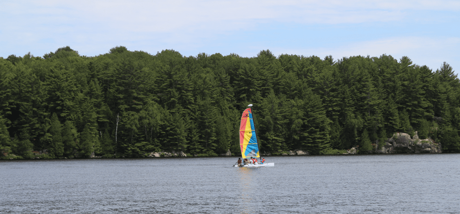 Sailboat at lake at Camp Tamarack