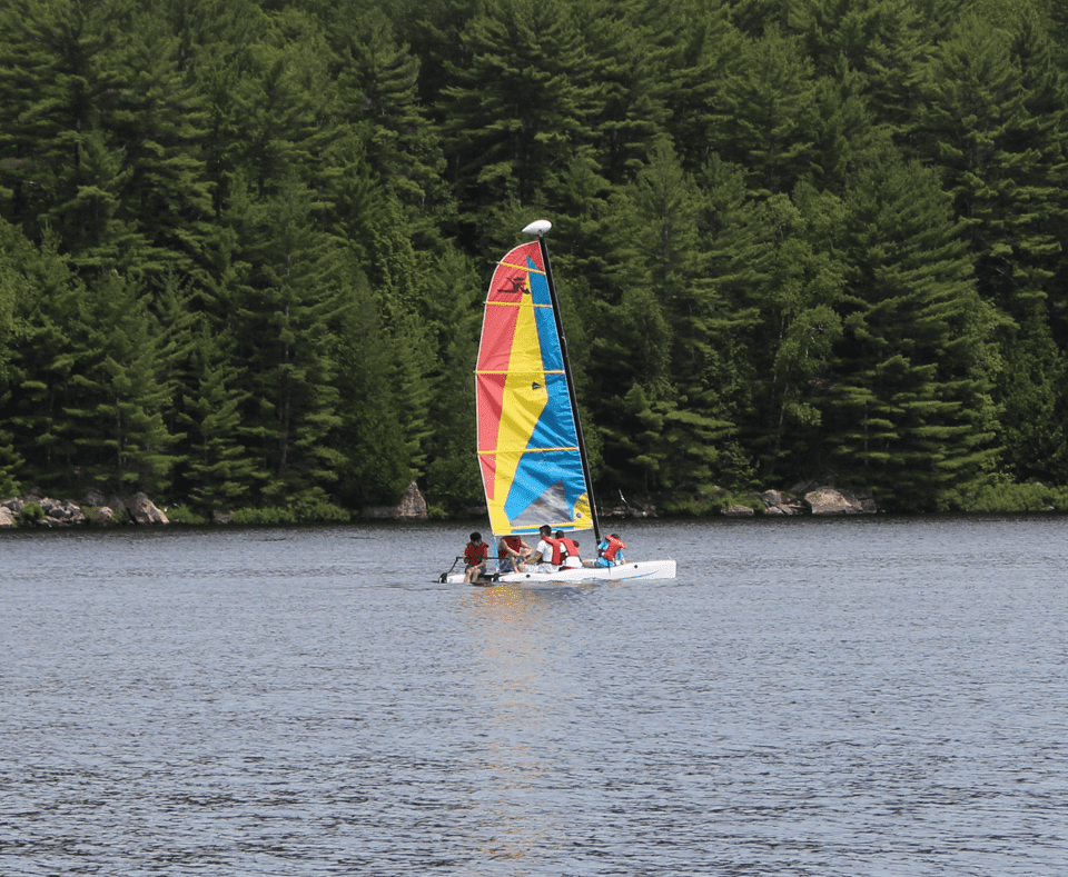 Sailboat on lake at Camp Tamarack