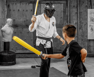 Camper and staff doing martial arts at Camp Tamarack