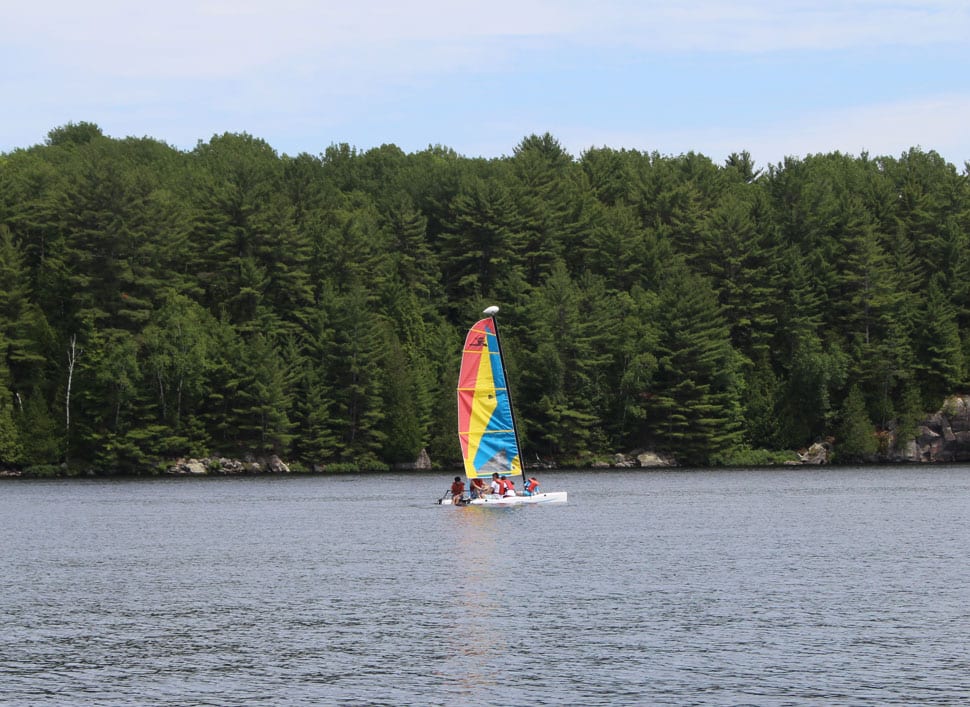 Sailboat on lake at Camp Tamarack